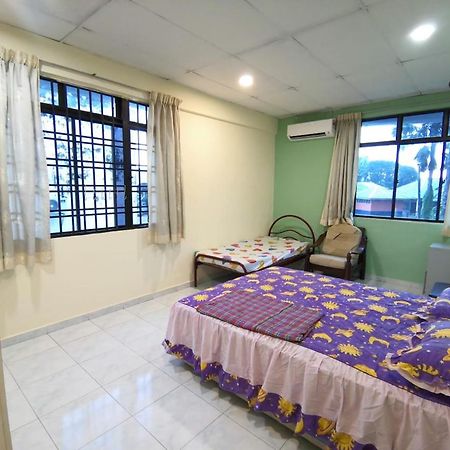 Cosy Homestay อูลูติรัม ภายนอก รูปภาพ