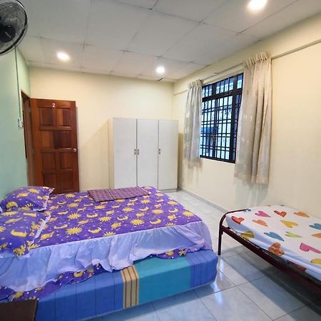 Cosy Homestay อูลูติรัม ภายนอก รูปภาพ