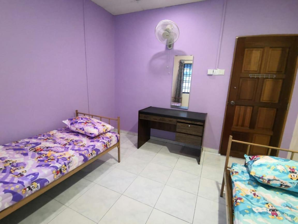 Cosy Homestay อูลูติรัม ภายนอก รูปภาพ
