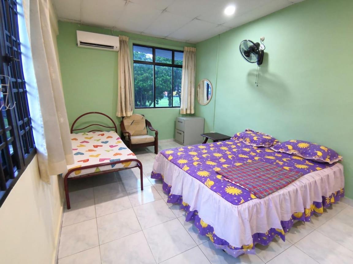 Cosy Homestay อูลูติรัม ภายนอก รูปภาพ