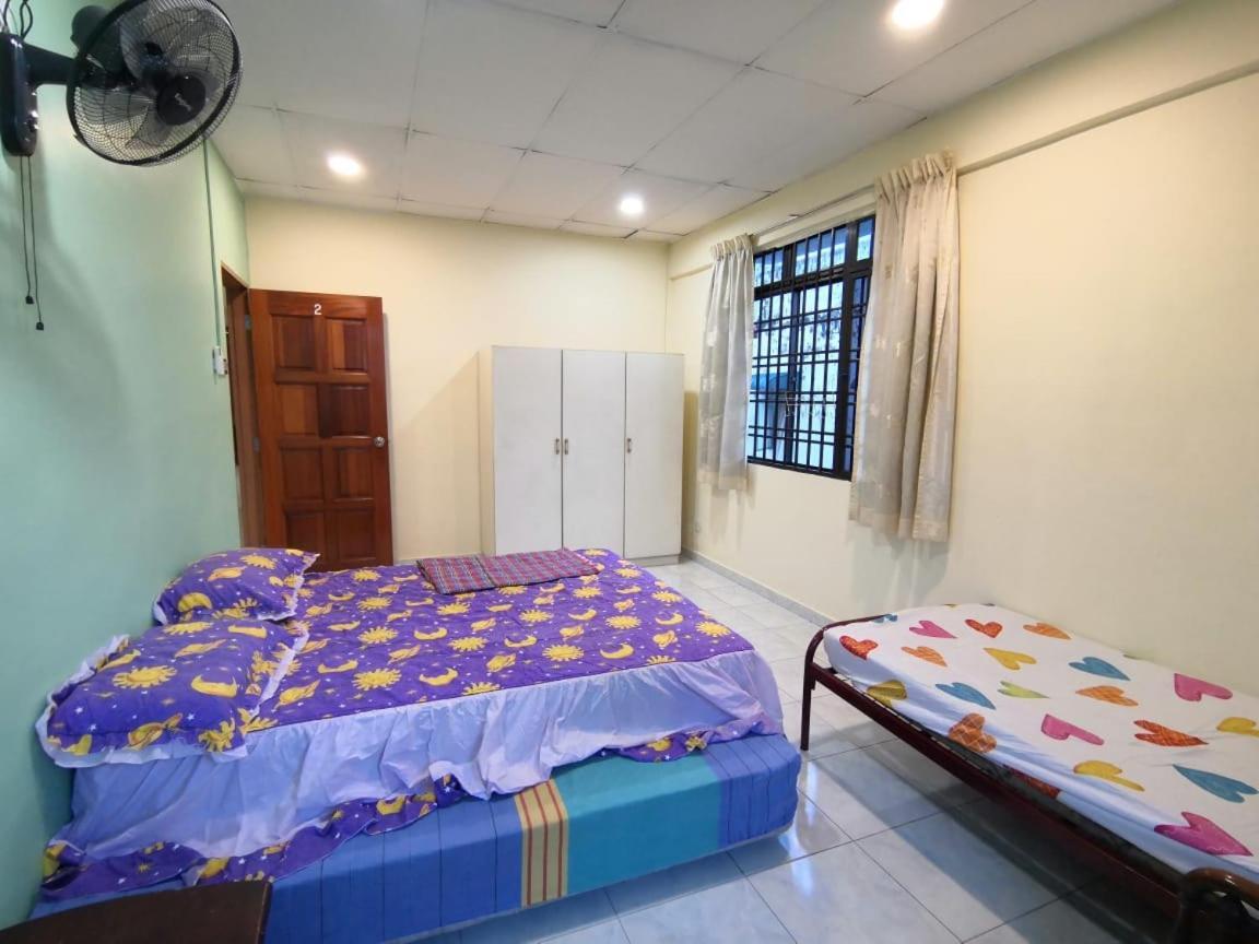 Cosy Homestay อูลูติรัม ภายนอก รูปภาพ