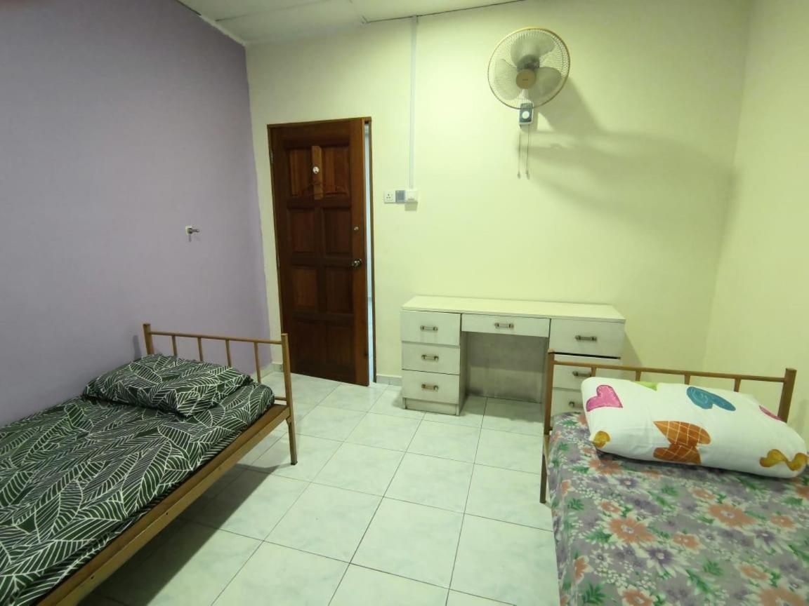 Cosy Homestay อูลูติรัม ภายนอก รูปภาพ